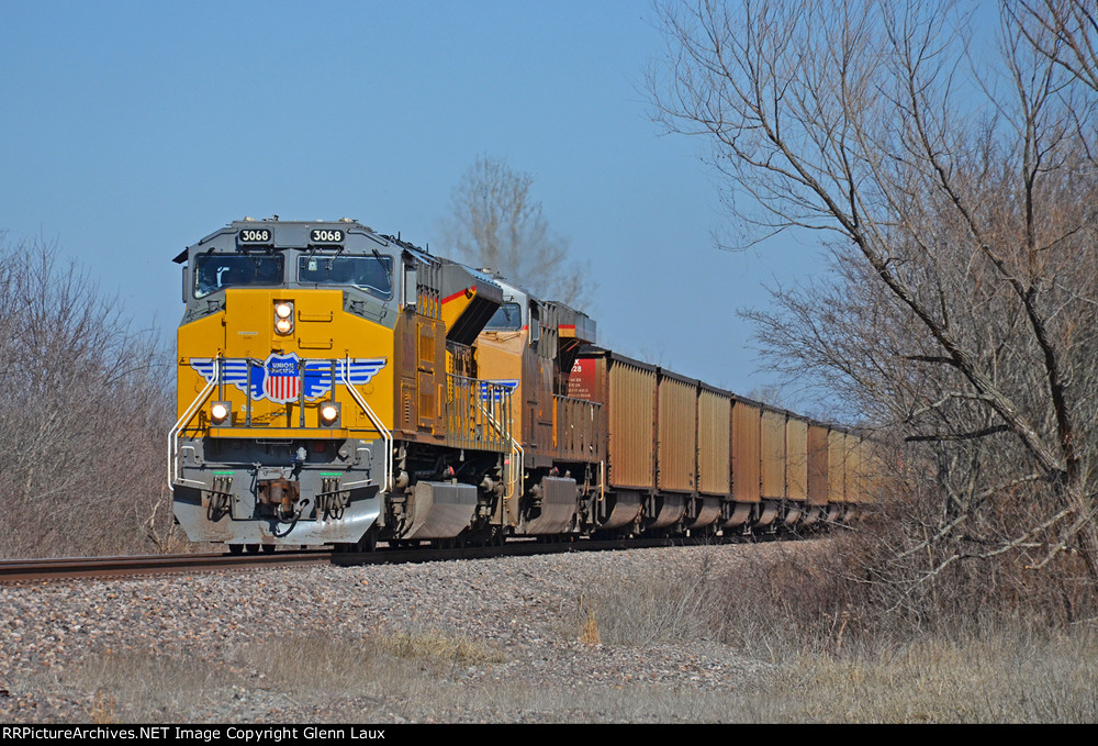 UP 3068 leads a southbound loaded coal train into town